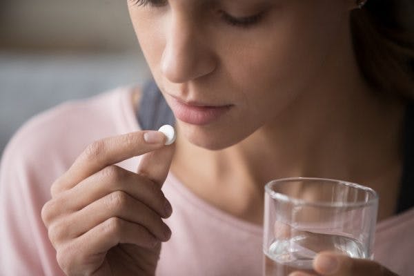woman taking baclofen for spinal cord injury spasticity management