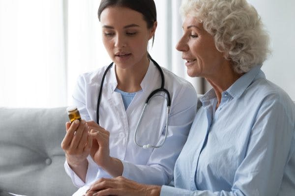 doctor explaining benefits of vitamin B12 for stroke recovery to patient