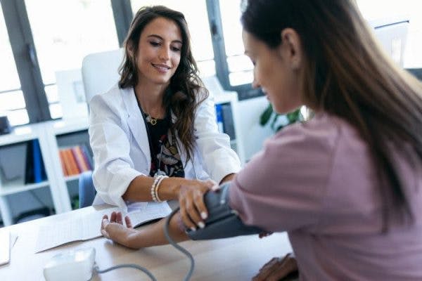 woman with spinal cord injury and low blood pressure getting treatment