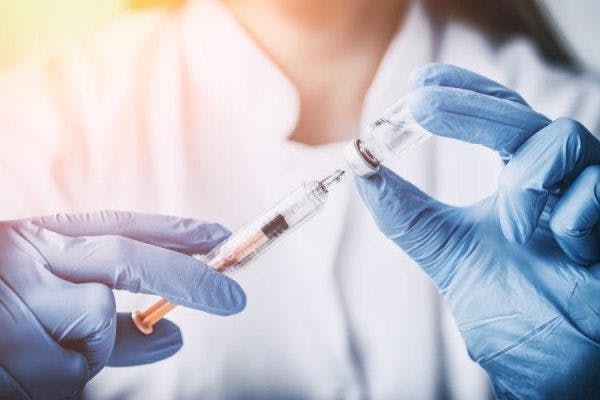 Doctor holding Botox for stroke patients with spasticity