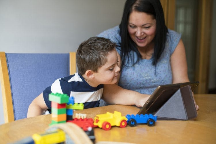 child with non0verbcal cerebral palsy using aac device