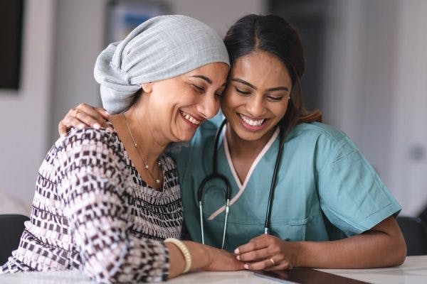 doctor comforting survivor after asking can a tbi get worse over time