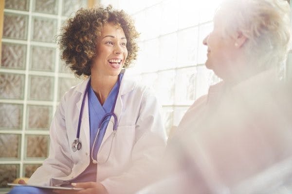 doctor sharing tbi recovery tips with survivor to boost rehabilitation process
