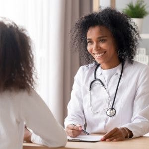 doctor talking to stroke survivor about treatment for behavior changes after stroke