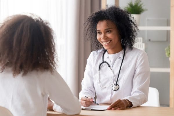 doctor talking to stroke survivor about treatment for behavior changes after stroke