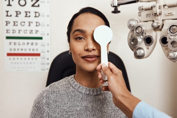 doctor helps survivor with regaining eyesight after stroke by testing her vision