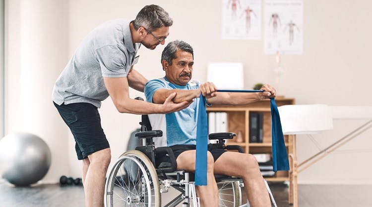 individual with incomplete spinal cord injury working on therapy