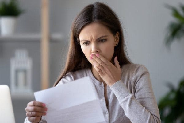 woman shocked at medical bills for cost of spinal cord injury treatment