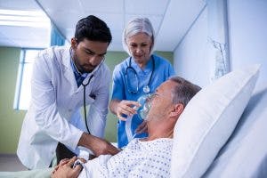 Man being treated for TBI respiratory problems