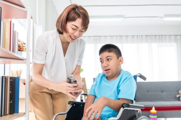 child with cerebral palsy experiencing motor impairments in hands