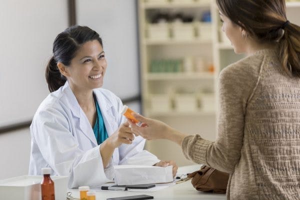 doctor discussing traumatic brain injury medication with a patient