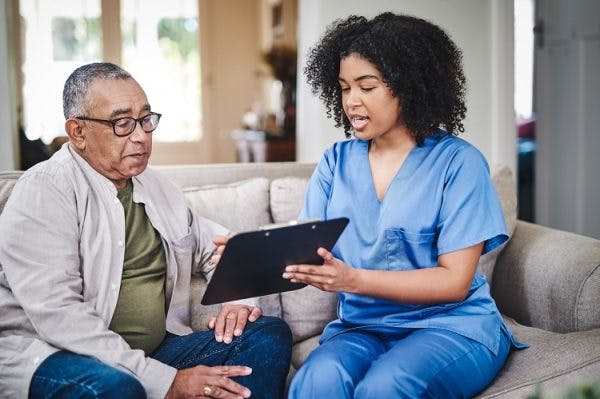 nurse explaining rehabilitation plan to mca stroke patient
