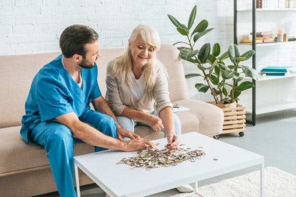 woman participating in occupational therapy for brain injury rehabilitation
