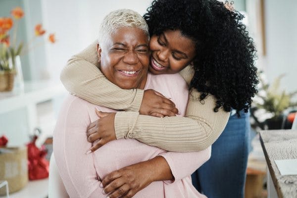 caregiver hugging stroke survivors with post traumatic stress disorder