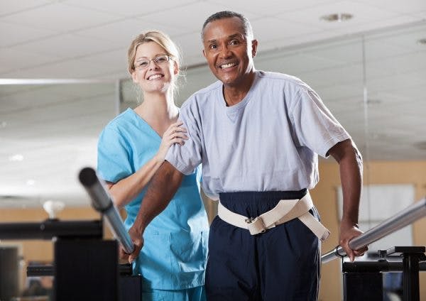 man with pusher syndrome practicing balance exercises