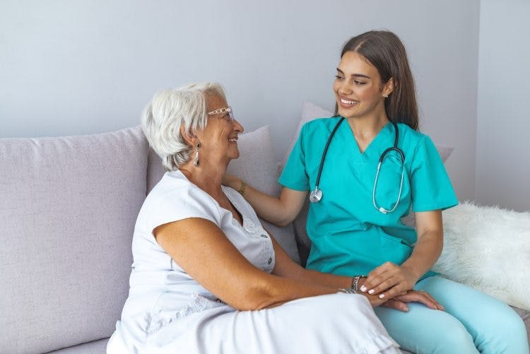 occupational therapist working with patient on sensory reeducation after stroke