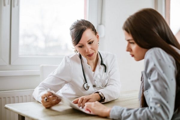 doctor explaining side effects of traumatic brain injury
