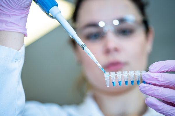 Scientist performing stem cell therapy research for brain injury treatment