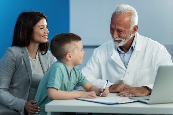 doctor explaining different associated conditions of cerebral palsy