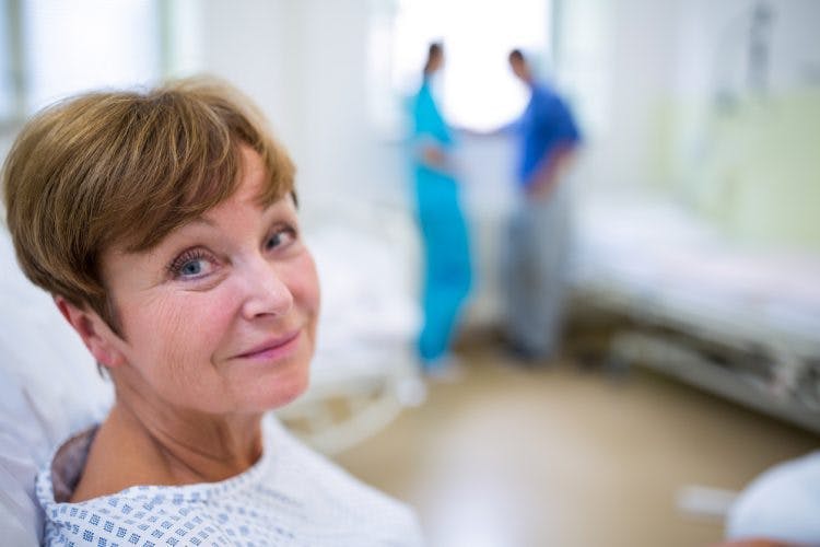 woman in hospital in early stages of stroke recovery process
