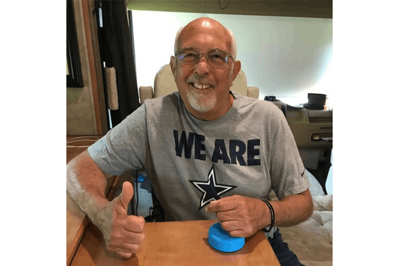 stroke survivor using the fitmi home rehab device at his house to get additional therapy